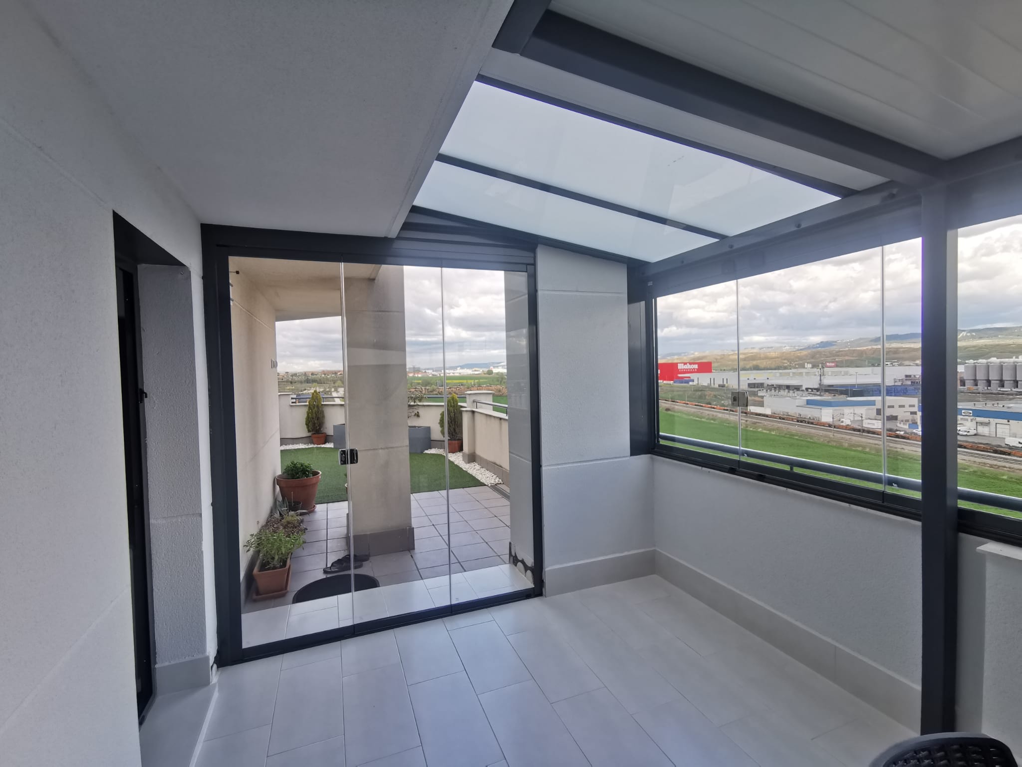 Cortinas de Cristal y Cerramientos GLASSLAND