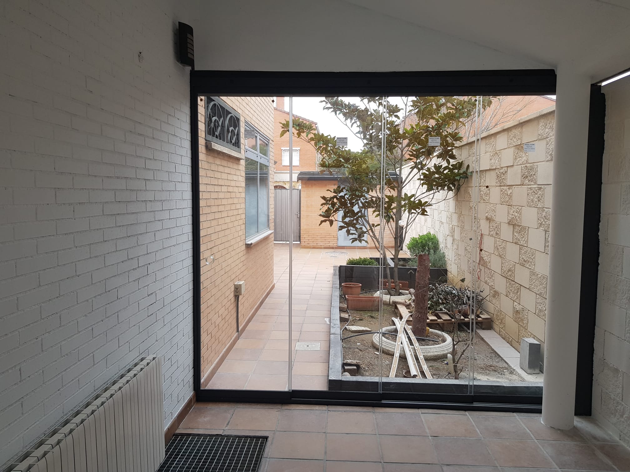 Cortinas de Cristal y Cerramientos GLASSLAND