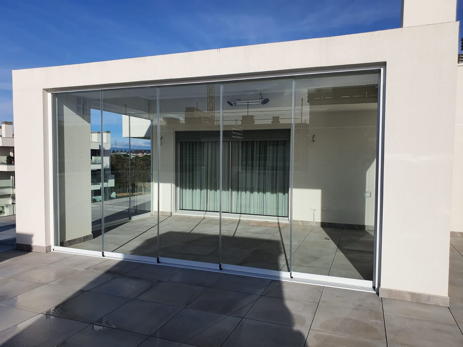 Cortinas de Cristal y Cerramientos GLASSLAND